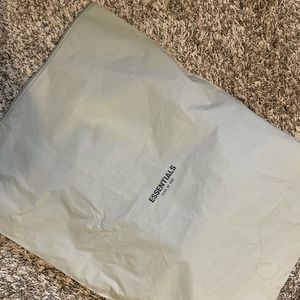 Essentials (Fear of God) coach jacket color Cement